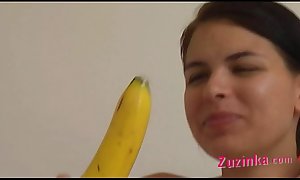 How-to: young gloominess girl teaches using a banana
